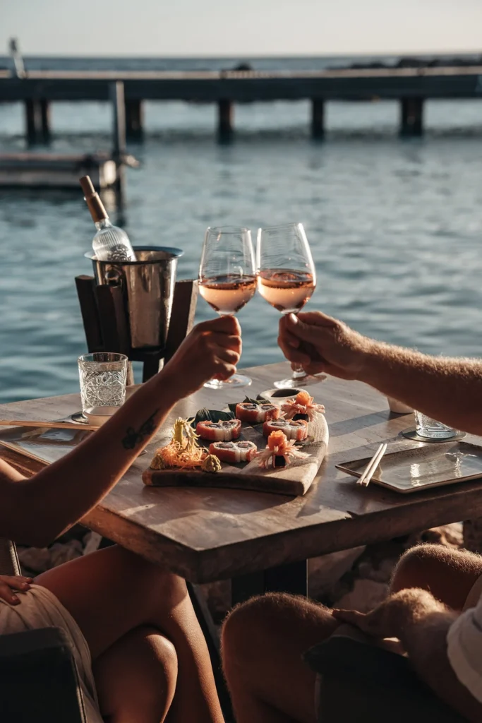 Waterfront dining with sushi and wine at Mood Beach